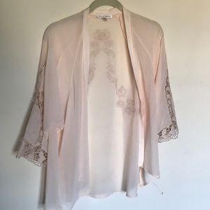 Sheer kimono with lace back and sleeve designs.